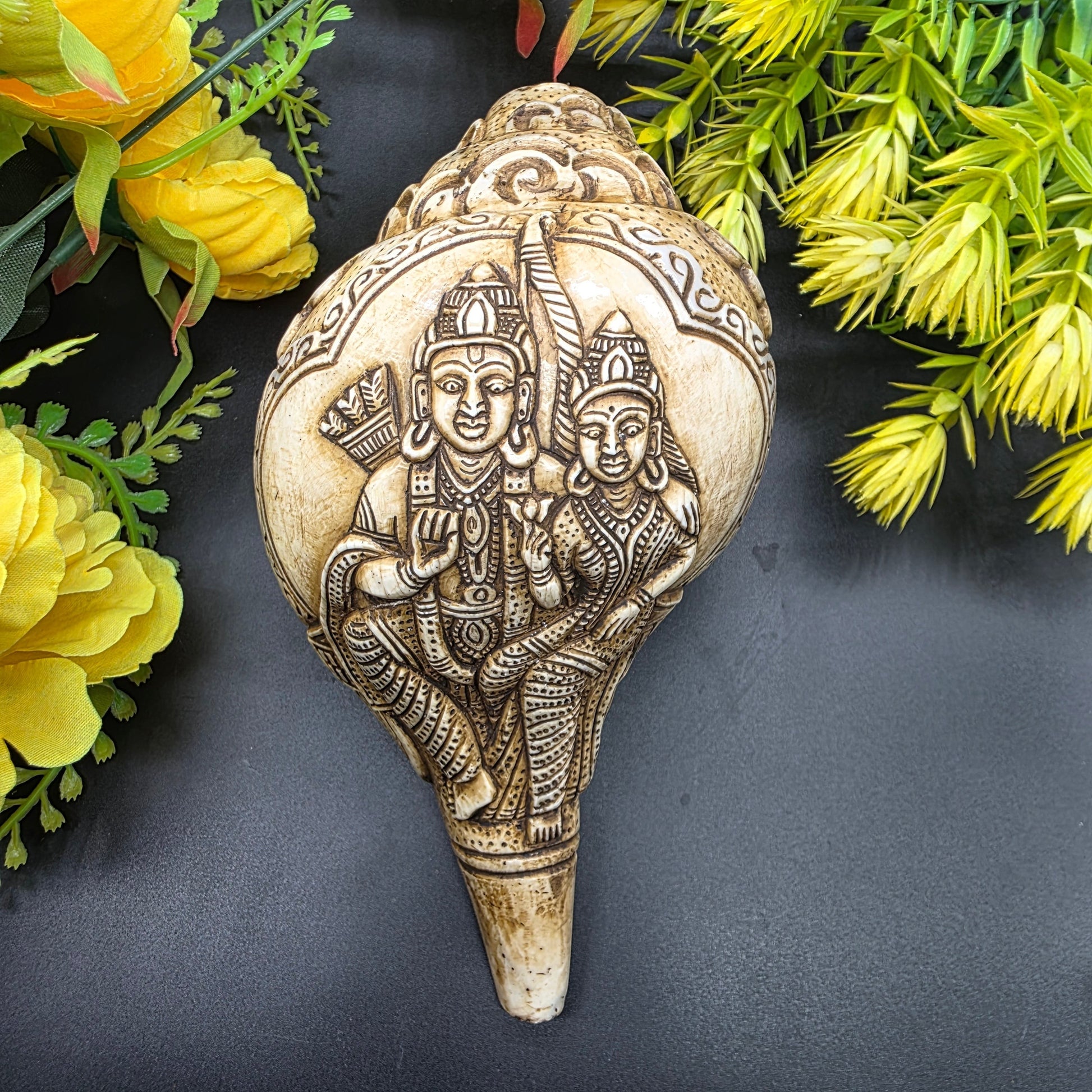 Vamavrati blowing shankh with engraved Lord Ram and Sita on white background