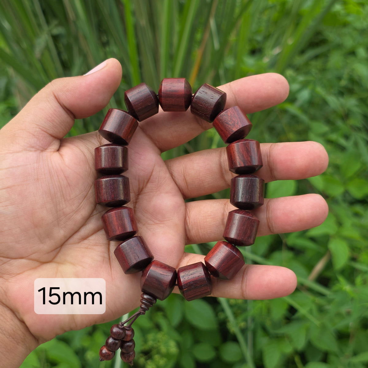 15mm Laal Chandan bracelet featuring polished reddish-brown cylindrical red sandalwood beads
