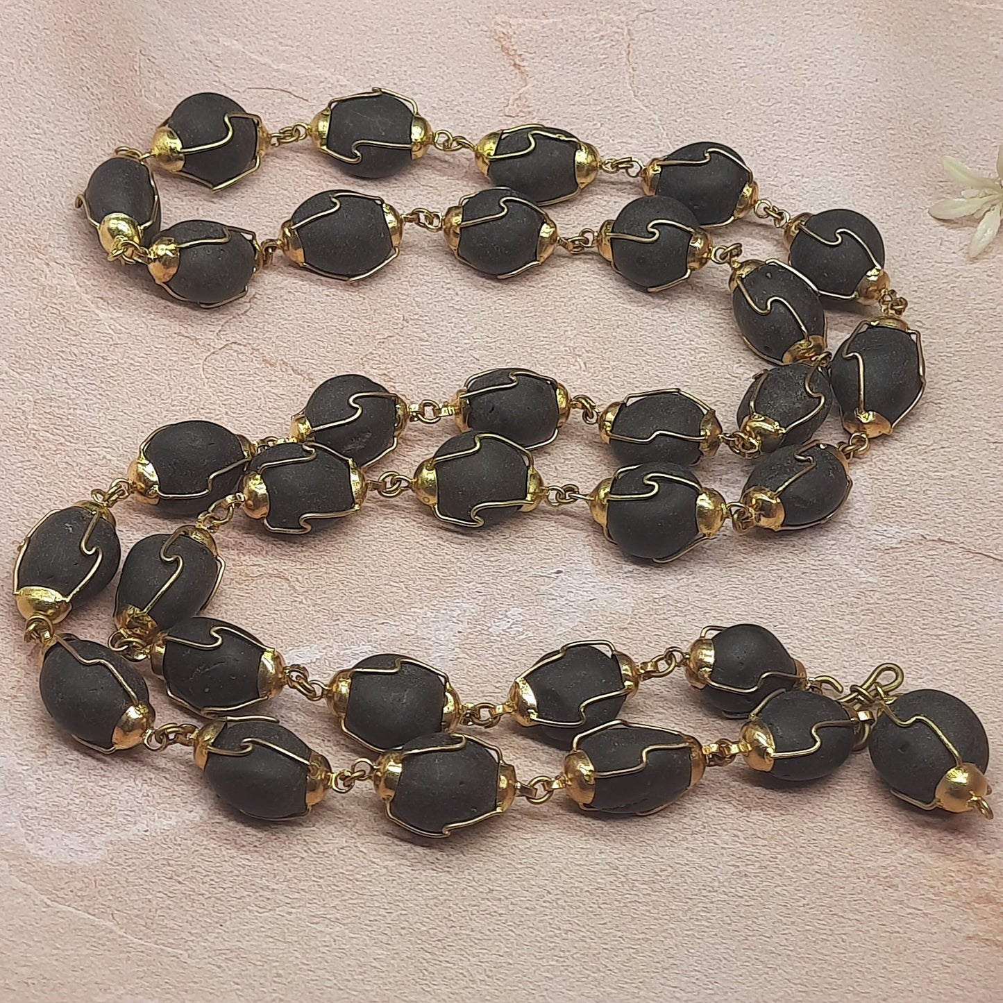 Natural Ladoo Gopal Shaligram Ji Mala in Gold Plated Capping - 32+1 Beads for Meditation & Spiritual Practice