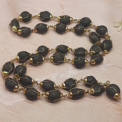 Natural Ladoo Gopal Shaligram Ji Mala in Gold Plated Capping - 32+1 Beads for Meditation & Spiritual Practice