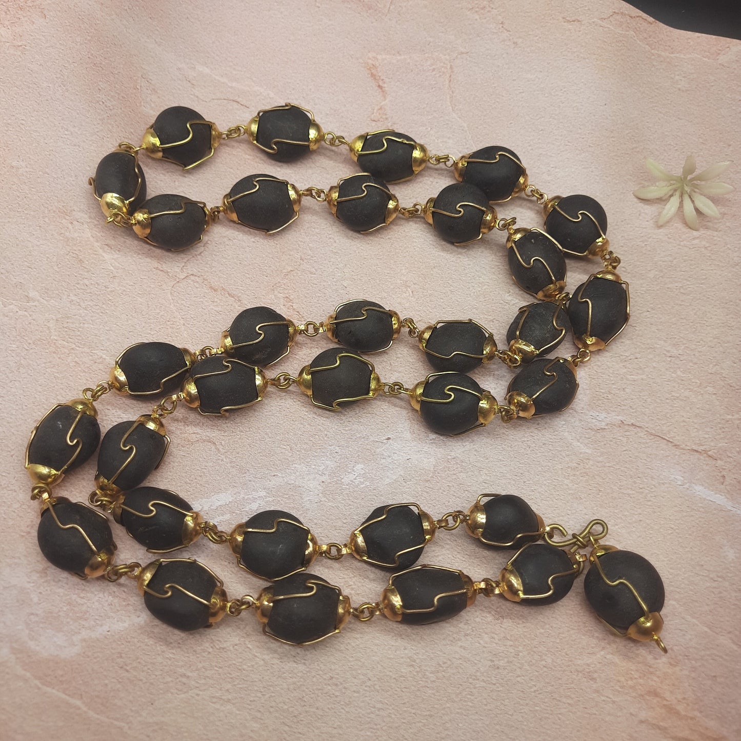 Natural Ladoo Gopal Shaligram Ji Mala in Gold Plated Capping - 32+1 Beads for Meditation & Spiritual Practice