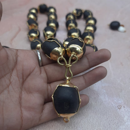 Natural Ladoo Gopal Shaligram Ji Mala in Gold Plated Capping - 28 Beads for Meditation & Spiritual Practice