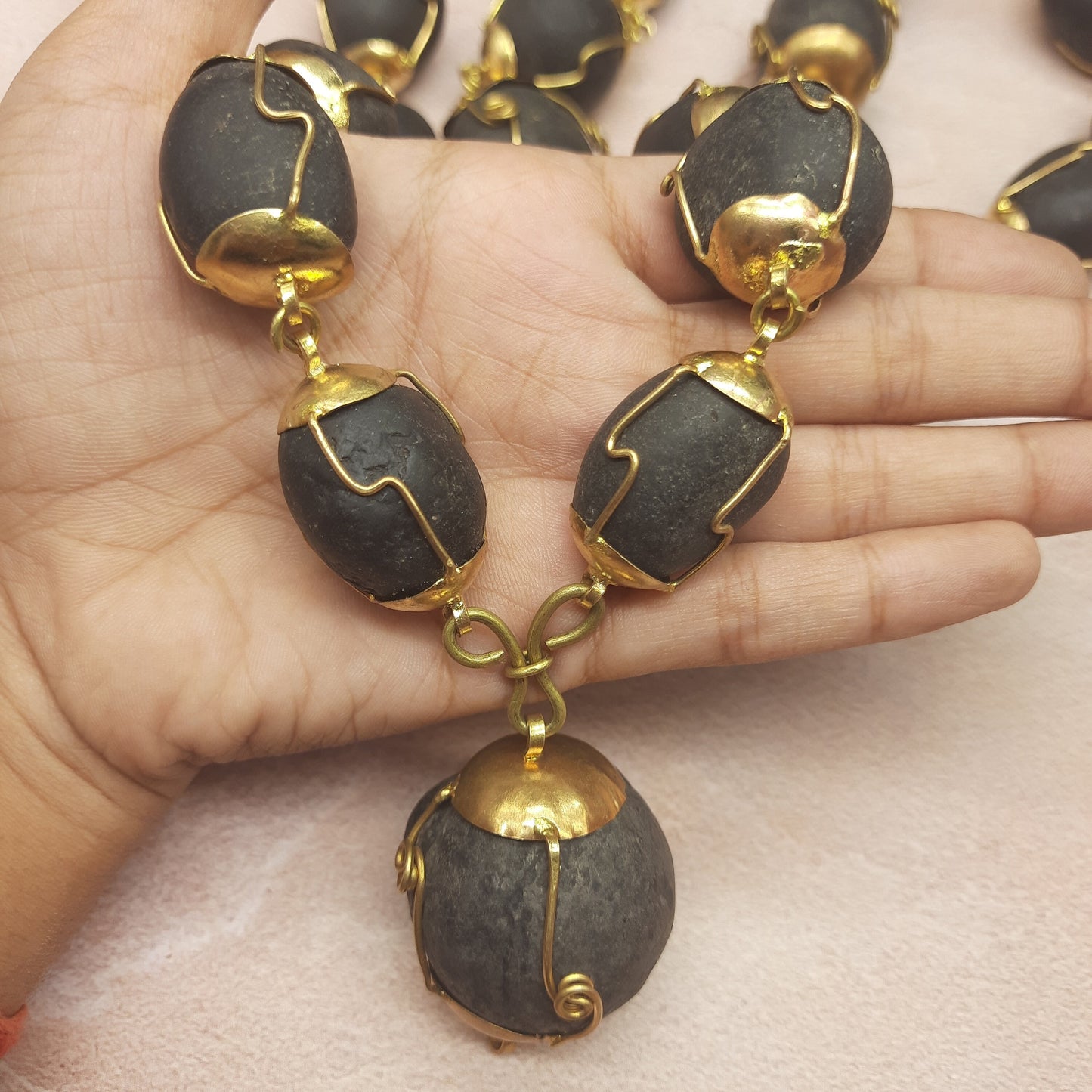 Natural Ladoo Gopal Shaligram Ji Mala in Gold Plated Capping - 28 Beads for Meditation & Spiritual Practice