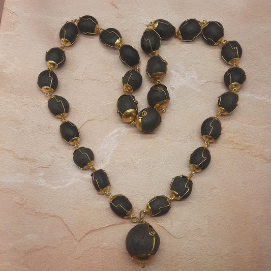 Natural Ladoo Gopal Shaligram Ji Mala in Gold Plated Capping - 28 Beads for Meditation & Spiritual Practice