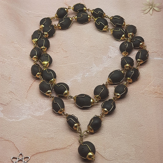Natural Ladoo Gopal Shaligram Ji Mala in Gold Plated Capping - 32+1 Beads for Meditation & Spiritual Practice