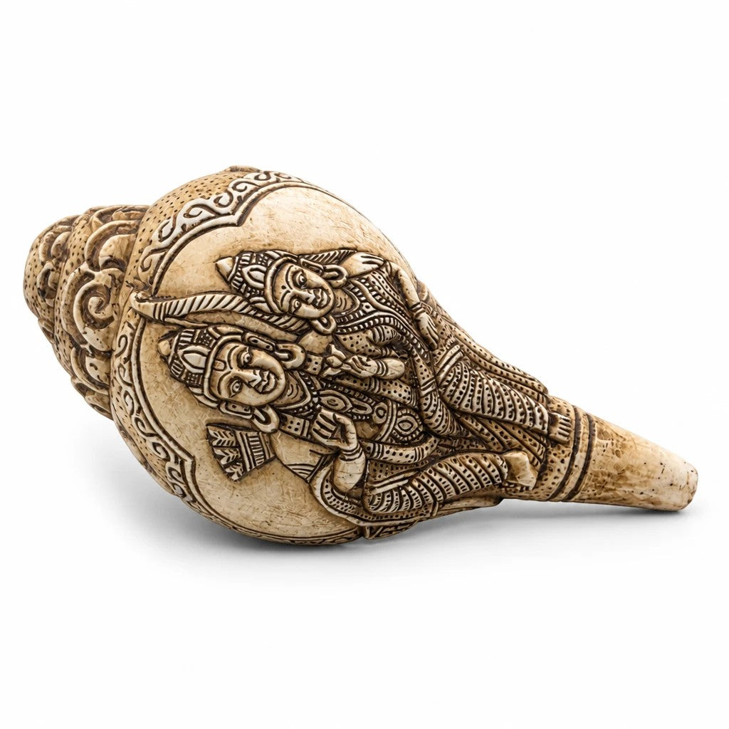 omrudrakshakendra.com Vamavrati blowing conch shell with intricate hand-carved Lord Ram and Sita Ji figures